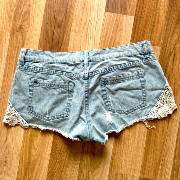 Distressed denim shorts - Picture 2 of 4